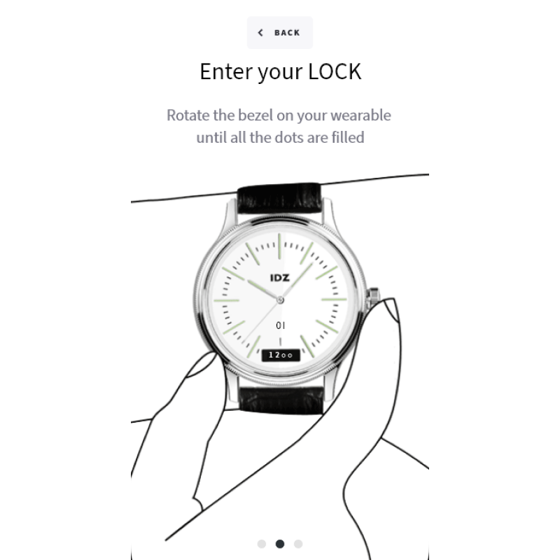 IDZ smartwatch held between two hands during secure LOCK setup